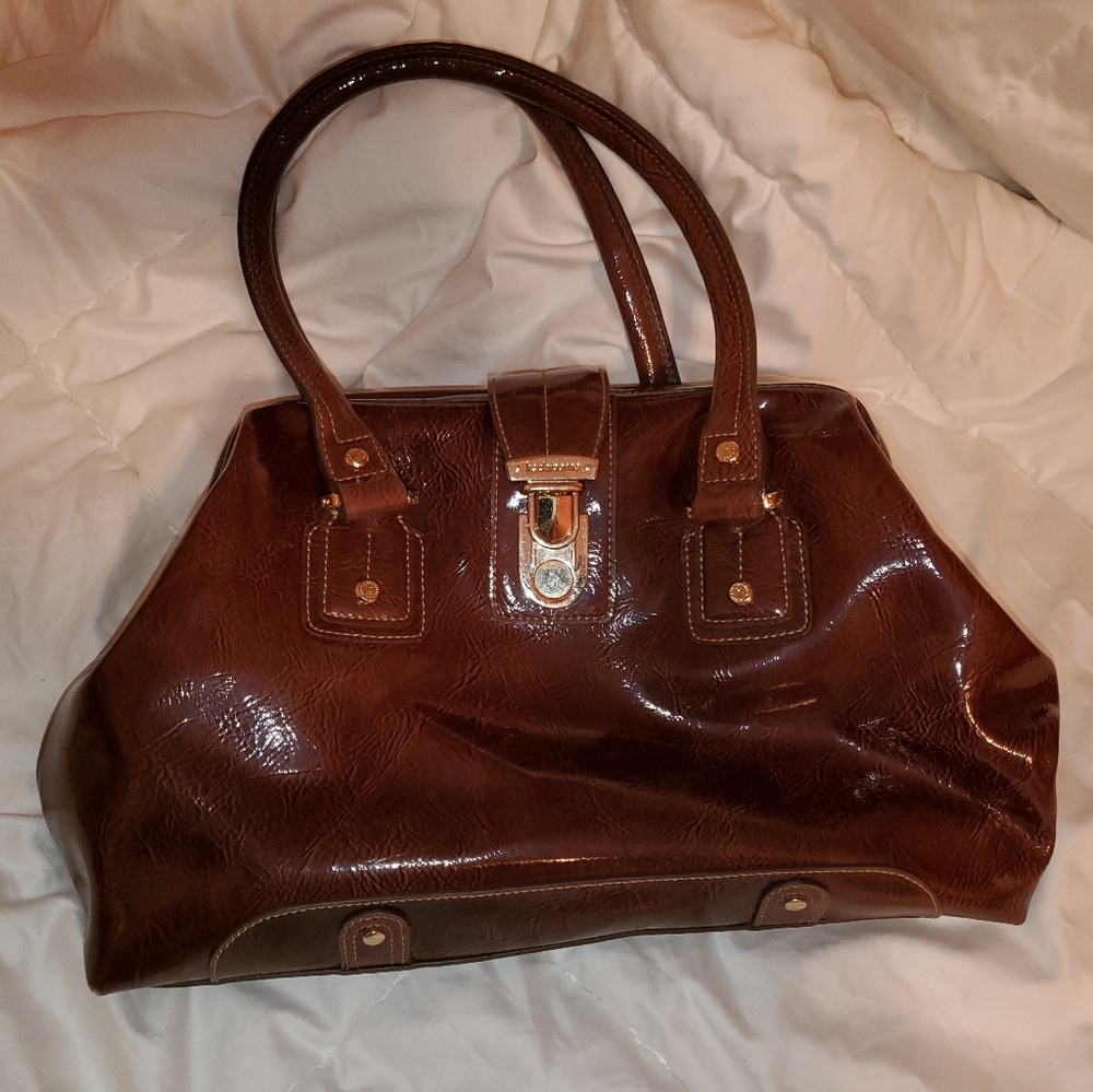 Brown leather purse with handles